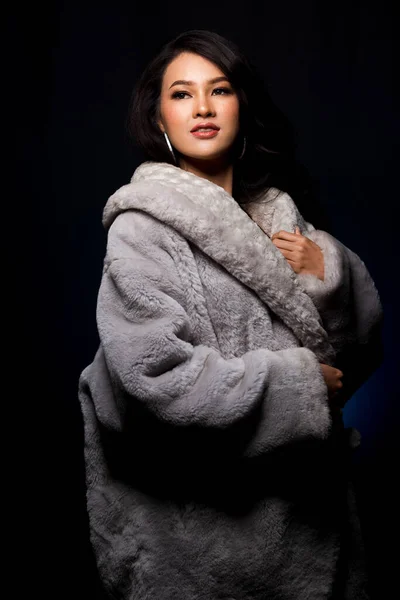 Portrait Miss beauty fashion asian woman in Fur Gray winter jacket dress black hair, color make up face hair style, studio lighting dark background copy space bubble sunglasses