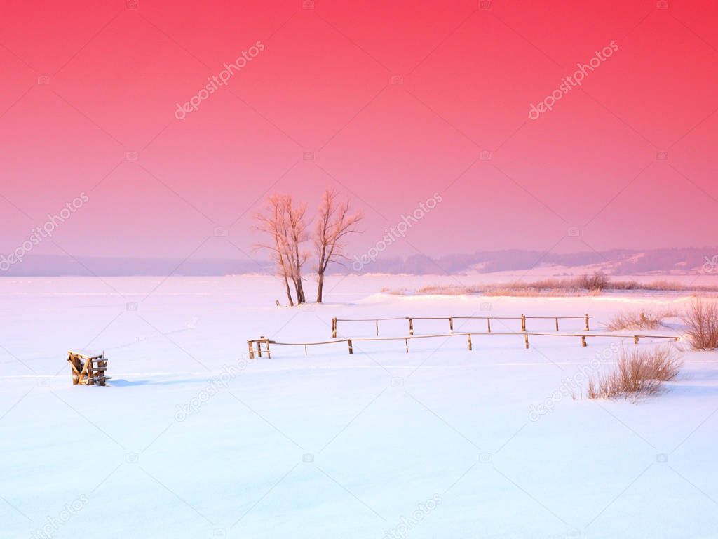 Sunset on the frozen river. Winter, Russia, Ural, Perm Region         