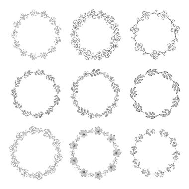 Beyaz arkaplanda çelenkler ve botanik çerçeveler.