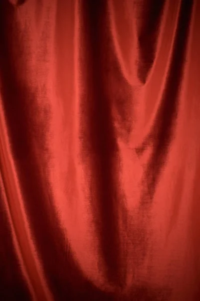 Красный бархатный фон ткани близко — стоковое фото