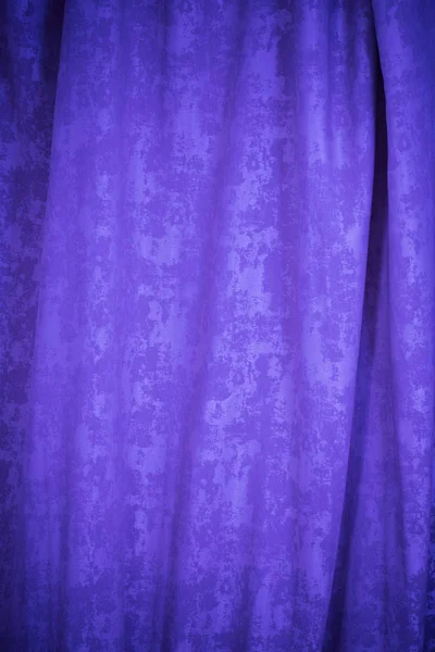 purple textured curtain background close up