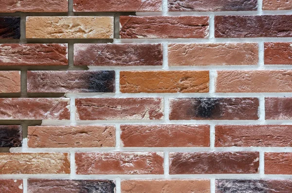 Mur de briques beige et marron. Contexte et texture de la maçonnerie . — Photo