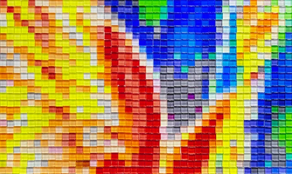 Multicolored ceramic mosaic tiles. Mosaic with bright squares.