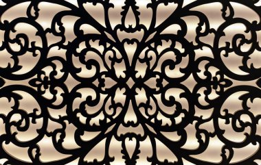 Decorative metal lattice with interior backlight. Black lattice on a beige background.