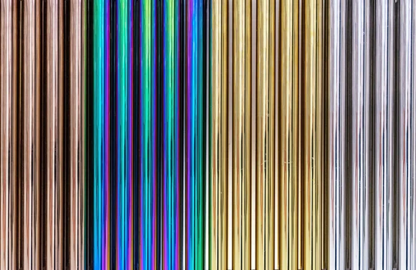 Tubi cromati multicolori. Sfondo da tubi metallici colorati . — Foto Stock
