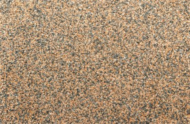 Dekoratif çakıl taşları. Kahverengi ve siyah çakıl taşlarının arkaplan ve dokusu.