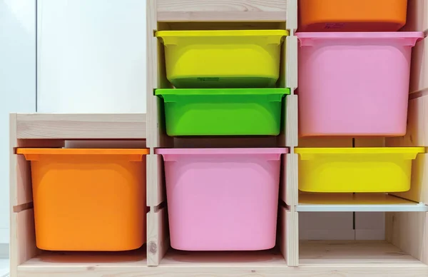 Wooden Rack Multi Colored Retractable Plastic Boxes — Stock Photo, Image