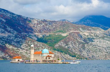Island of Virgin on reef (Gospa od Skrpela Island), Montenegro clipart