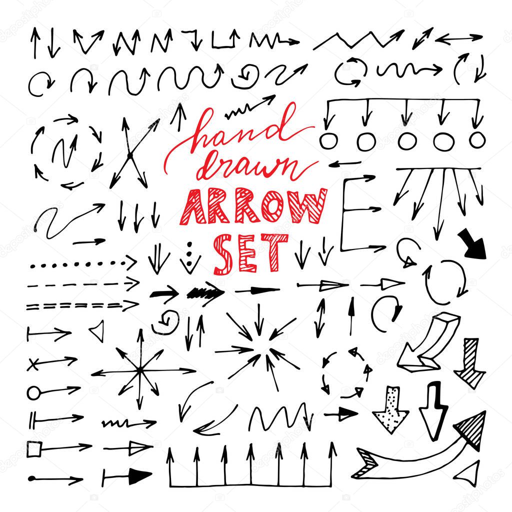 Hand drawn black arrows set on white background