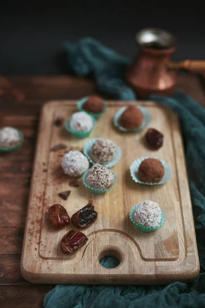 Homemade chocolate sweets on cutting board