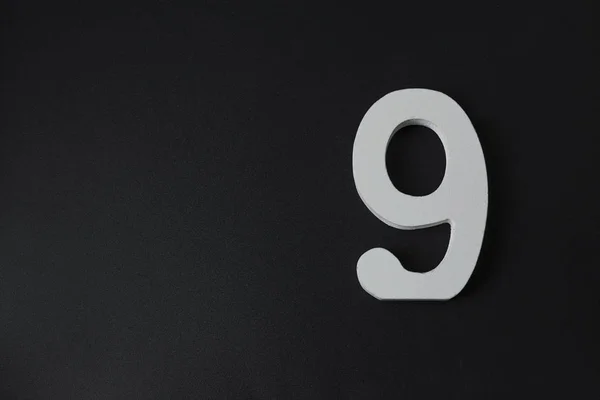 Number nine on black background. — Stock Photo, Image