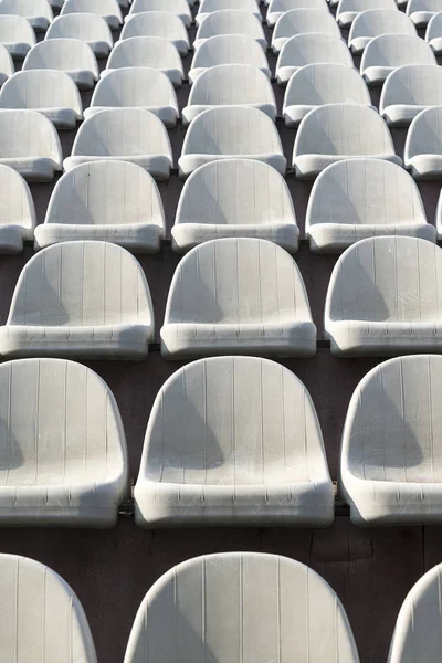 Gray chairs in the stands of the arena. — Stock Photo, Image