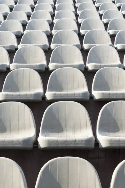 Sillas grises en los stands de la arena . —  Fotos de Stock