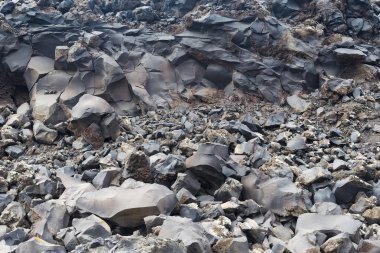 Santorini Adası üzerinden volkanik taş dokusuna.