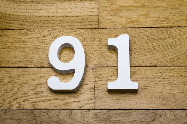 数字は、木製、寄せ木細工の床で 90-1. — ストック写真