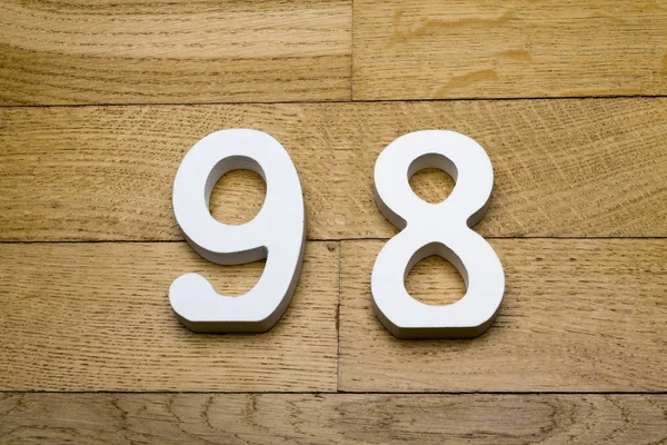 木製、寄せ木細工の床で 90 8 の数字. — ストック写真