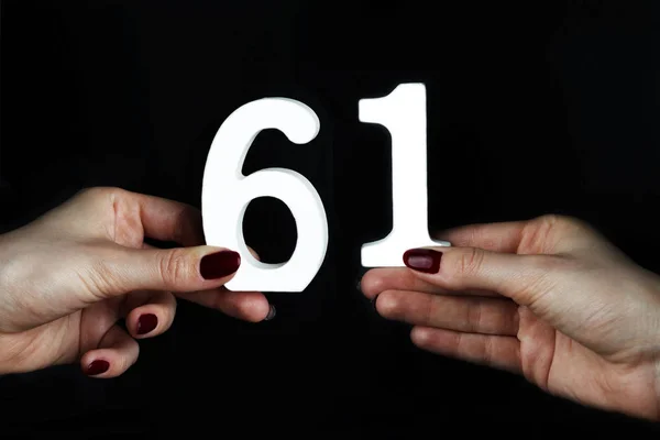 To female hands the number nine. — Stock Photo, Image