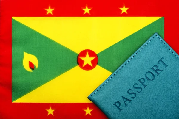 Grenada bayrağının arkasında bir pasaport var..