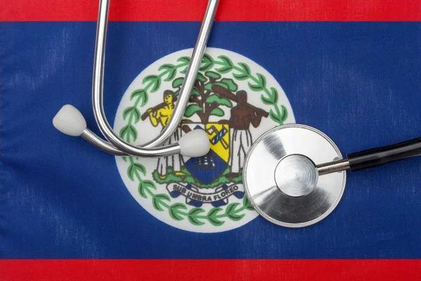 伯利兹国旗和听诊器。 医学的概念. — 图库照片