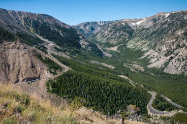 Destination Highway:  The Beartooth Highway between Montana and Wyoming is designated both a National Scenic Byway and an All American Road, recommending it as a worthy destination in its own right. clipart