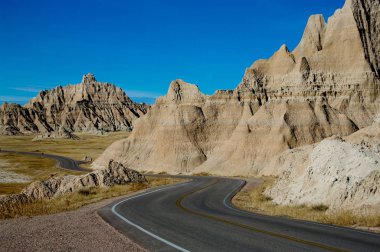 Park Road:  A paved road winds through Badlands National Park.