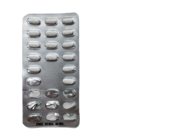 Opakowanie tabletek na białym tle nad białym — Zdjęcie stockowe