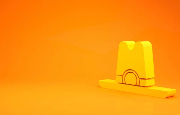 Жёлтая Западная Шапка Ушанка Выделена Оранжевом Фоне Концепция Минимализма Рендеринг — стоковое фото