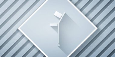 Kağıt kesiği ya da koltuk değneği simgesi gri arkaplanda izole edilmiş. Kas iskeleti hastalığı olan insanların rehabilitasyonu için gerekli ekipman. Kağıt sanatı tarzı. Vektör İllüstrasyonu