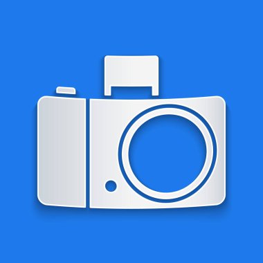 Kağıt kesiği Fotoğraf Makinesi simgesi mavi arkaplanda izole edildi. Fotoğraf makinesi simgesi. Kağıt sanatı tarzı. Vektör İllüstrasyonu