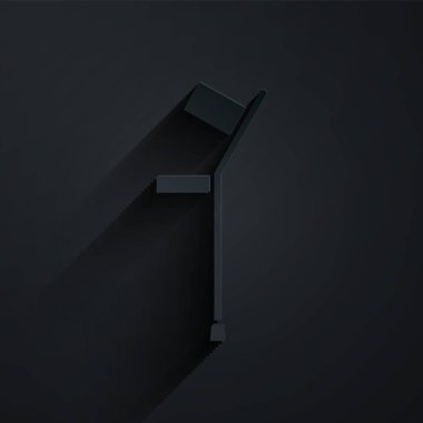 Kağıt kesiği ya da koltuk değneği simgesi siyah arkaplanda izole edilmiş. Kas iskeleti hastalığı olan insanların rehabilitasyonu için gerekli ekipman. Kağıt sanatı tarzı. Vektör İllüstrasyonu