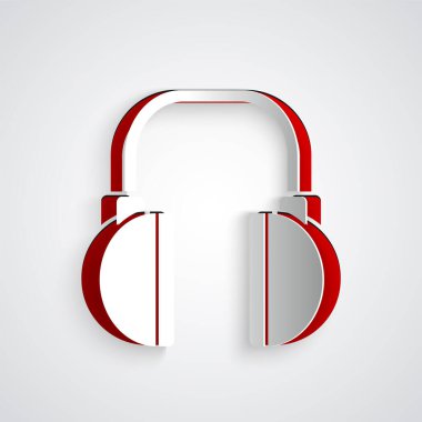 Kağıt kesiği kulaklık simgesi gri arkaplanda izole edilmiş. Kulaklıklar. Müzik, hizmet, iletişim ve operatör konsepti. Kağıt sanatı tarzı. Vektör İllüstrasyonu