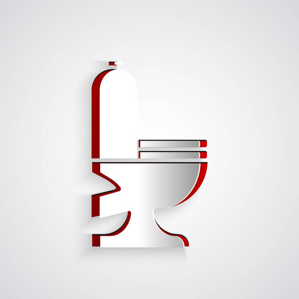 Иконка унитаза вырезанная бумагой изолирована на сером фоне. Бумажный стиль. Векторная миграция