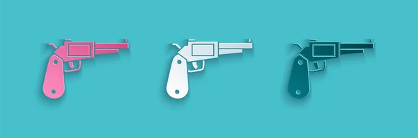 Paper cut Revolver gun icon isolated on blue background. Paper art style. Vector Illustration — Stock Vector