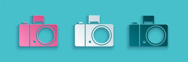 Papiergeschnittene Fotokamera-Ikone isoliert auf blauem Hintergrund. Ikone der Fotokamera. Papierkunst. Vektorillustration — Stockvektor