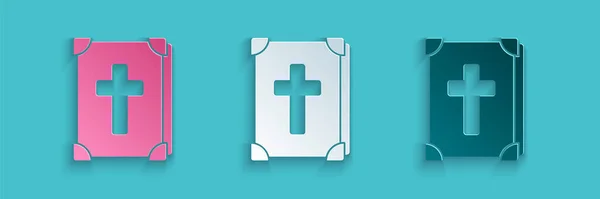 Papier découpé Icône de livre de bible sainte isolé sur fond bleu. Style art du papier. Illustration vectorielle — Image vectorielle