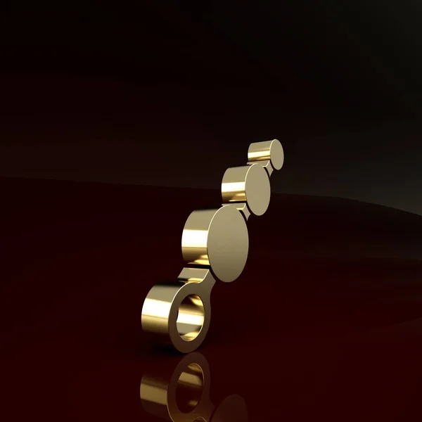 Золотые анальные бусины значок изолирован на коричневом фоне. Знак анальных яиц. Фетиш-аксессуар. Секс-игрушка для мужчин и женщин. Концепция минимализма. 3D-рендеринг — стоковое фото