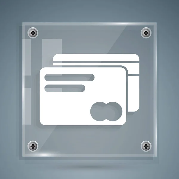 Icono blanco de la tarjeta de crédito aislado sobre fondo gris. Pago en línea. Retiro de efectivo. Operaciones financieras. Señal de compra. Paneles cuadrados de vidrio. Ilustración vectorial — Vector de stock