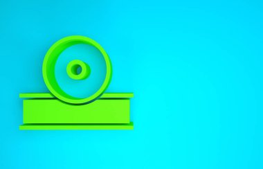 Yeşil Otolaryngological baş yansıtıcı ikonu mavi arkaplanda izole edildi. Hastaların kulak, boğaz ve burun muayenesi için ekipman. Minimalizm kavramı. 3d illüstrasyon 3B canlandırma