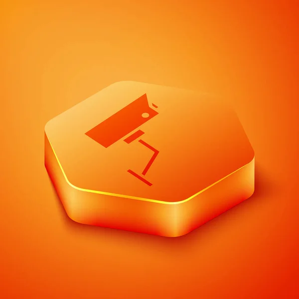 Isométrique Icône Caméra Sécurité Isolé Sur Fond Orange Bouton Hexagonal — Image vectorielle