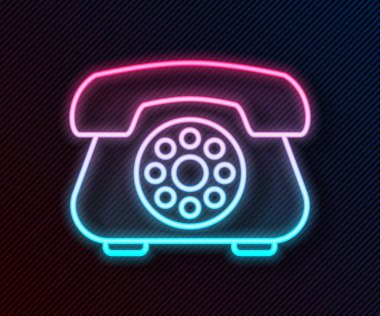 Parlayan neon hattı telefon ikonu siyah arkaplanda izole edildi. Sabit telefon. Vektör İllüstrasyonu