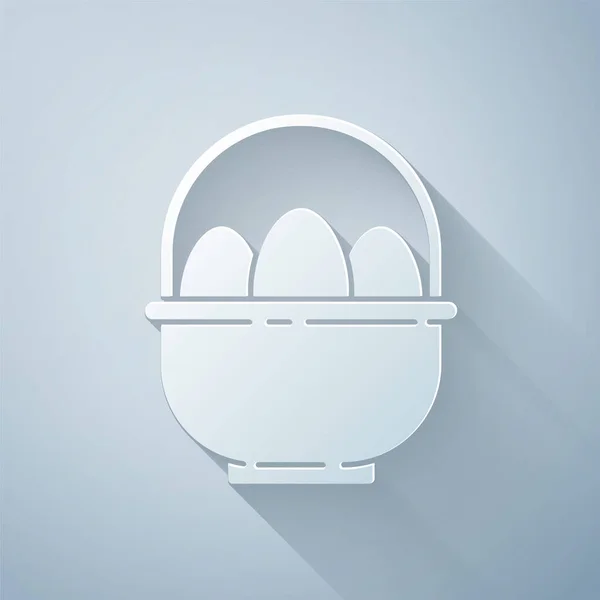 Řezaný papír Košík s ikonou velikonočních vajíček izolovaných na šedém pozadí. Veselé Velikonoce. Papírový styl. Vektorová ilustrace — Stockový vektor