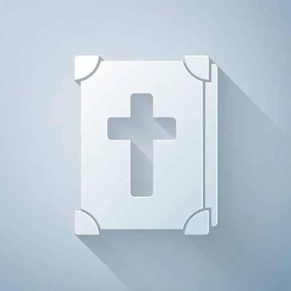 Papper skär helig bibel bok ikon isolerad på grå bakgrund. Papperskonst stil. Vektor illustration — Stock vektor