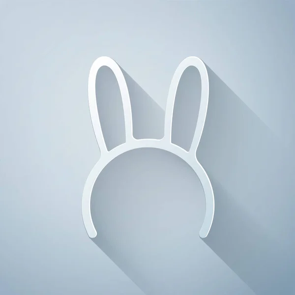 Máscara de corte de papel con orejas largas de conejo icono aislado sobre fondo gris. Estilo de arte de papel. Ilustración vectorial — Vector de stock