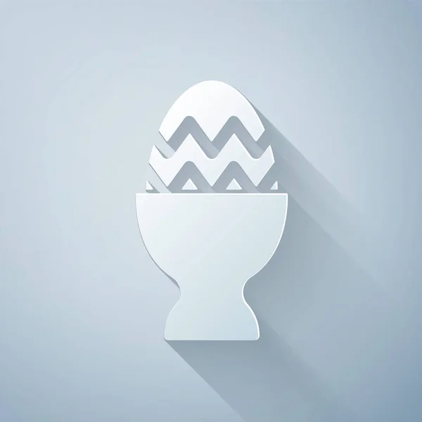 Paper cut Easter egg on a stand icon isolated on grey background. Happy Easter. Paper art style. Vector Illustration — Stock Vector