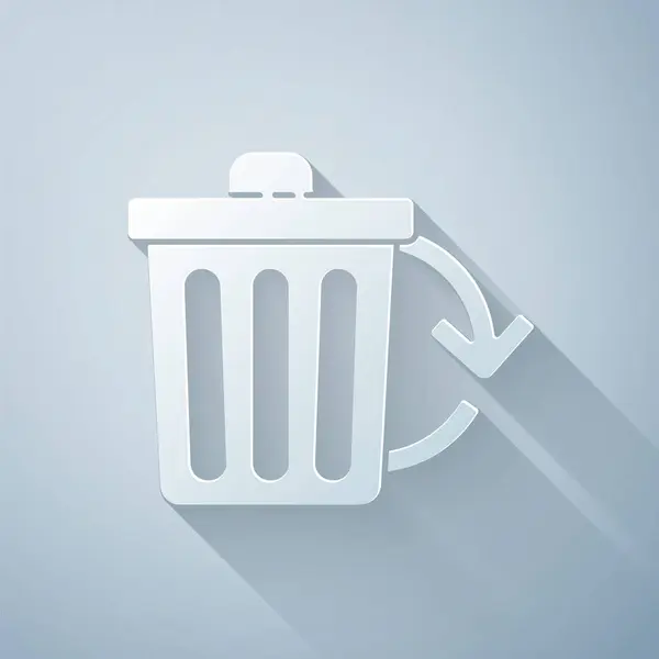 Papier knippen Prullenbak met recycle symbool icoon geïsoleerd op grijze achtergrond. Prullenbakpictogram. Vuilnis bin teken. Recycle mand teken. Papier kunststijl. Vector illustratie — Stockvector