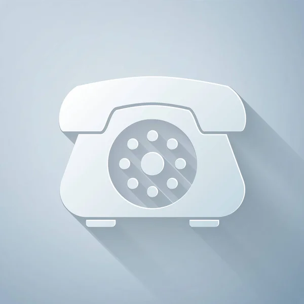 Taglio carta Icona telefonica isolata su sfondo grigio. Telefono fisso. Stile cartaceo. Illustrazione vettoriale — Vettoriale Stock