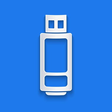 Kağıt kesikli USB flash disk simgesi mavi arkaplanda izole edildi. Kağıt sanatı tarzı. Vektör İllüstrasyonu