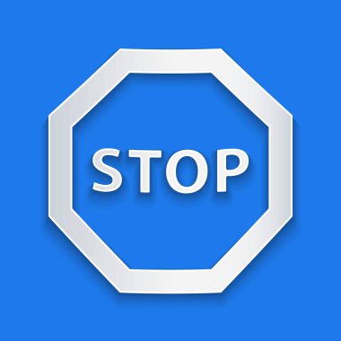 Kağıt kesiği Dur işareti simgesi mavi arkaplanda izole edildi. Trafik yönetmeliklerine göre dur işareti. Kağıt sanatı tarzı. Vektör İllüstrasyonu