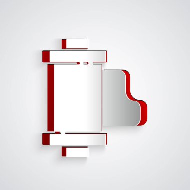 Kağıt kesiği, gri arkaplanda izole edilmiş eski model film rulo kartuş simgesi. 35 mm 'lik film kutusu. Film şeridi fotoğrafçı ekipmanı. Kağıt sanatı tarzı. Vektör İllüstrasyonu