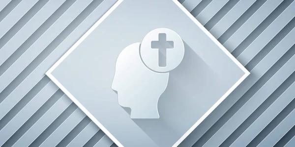 Paper cut Human head with christian cross icon isolated on grey background. Paper art style. Vector Illustration